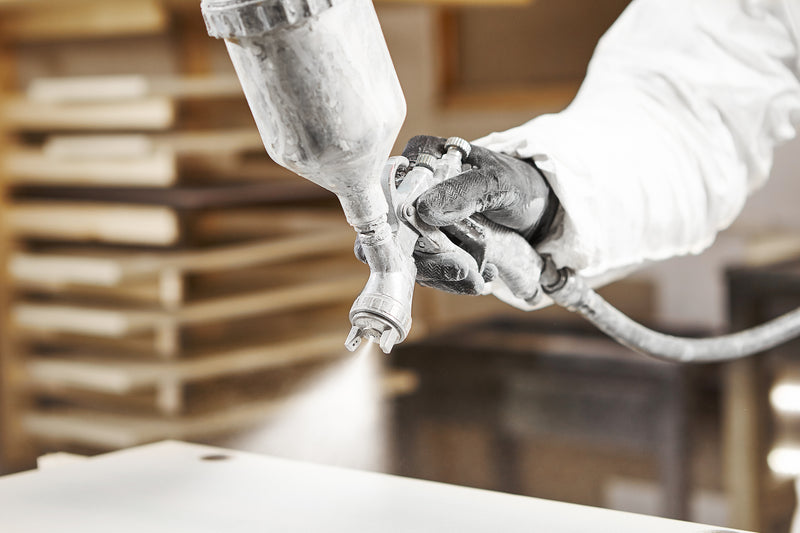 Spraying Primer on wood